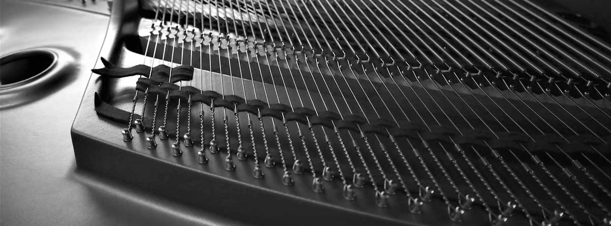 Black and white interior of a piano